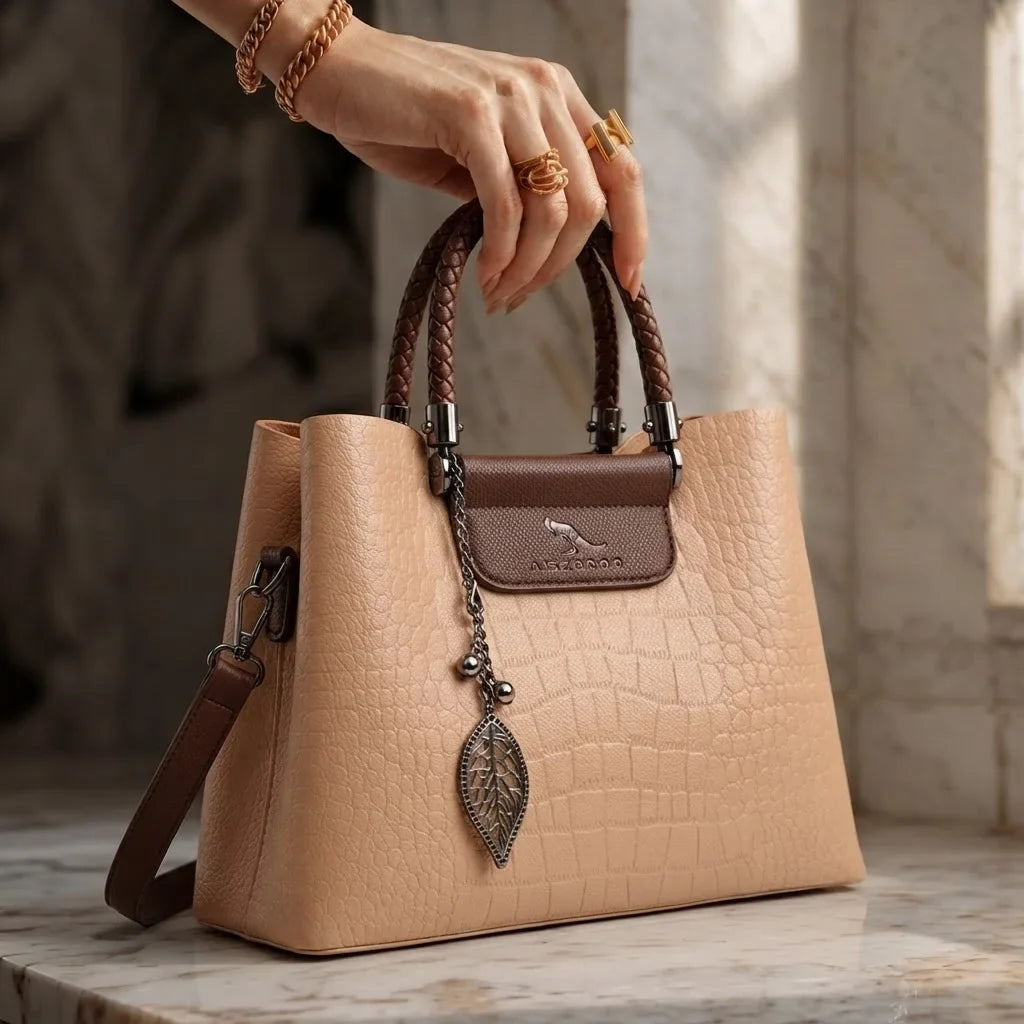 Croc-embossed leather shoulder bag with braided top handle