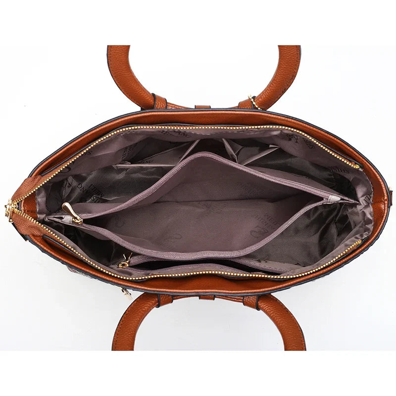 Croc-embossed leather satchel with top handles and crossbody strap