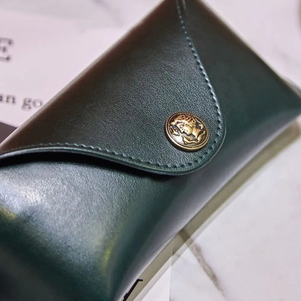 Vintage leather sunglasses case with antique cameo snap
