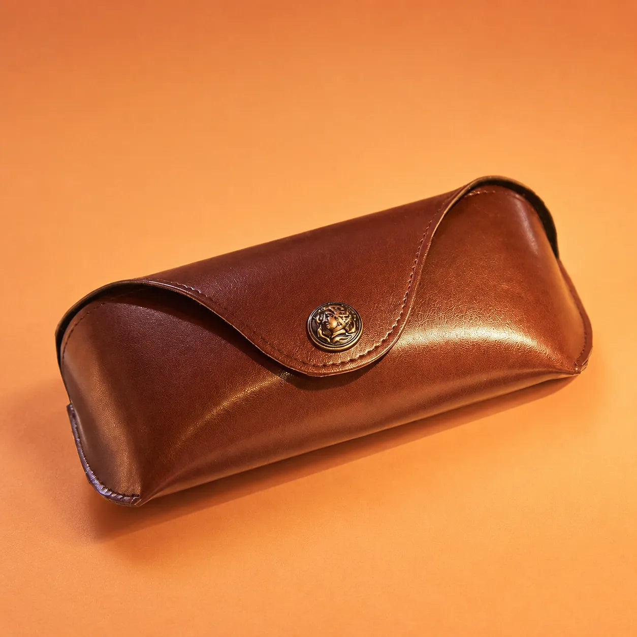 Vintage leather sunglasses case with antique cameo snap